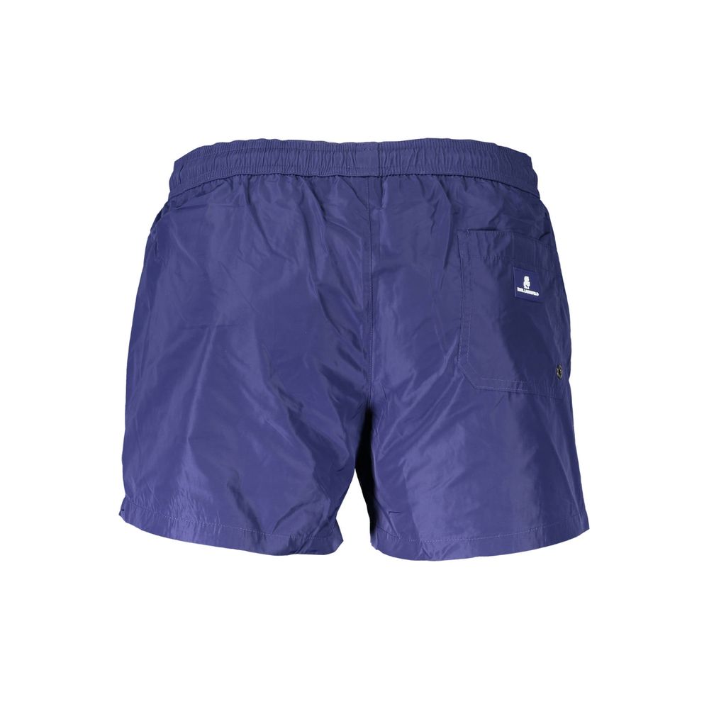Swim Shorts by Karl Lagerfeld for men in polyester blue & print features a resort ready silhouette, perfectly capturing the resort ready aesthetic of Men's Polyester Swim Shorts with a resort ready finish.