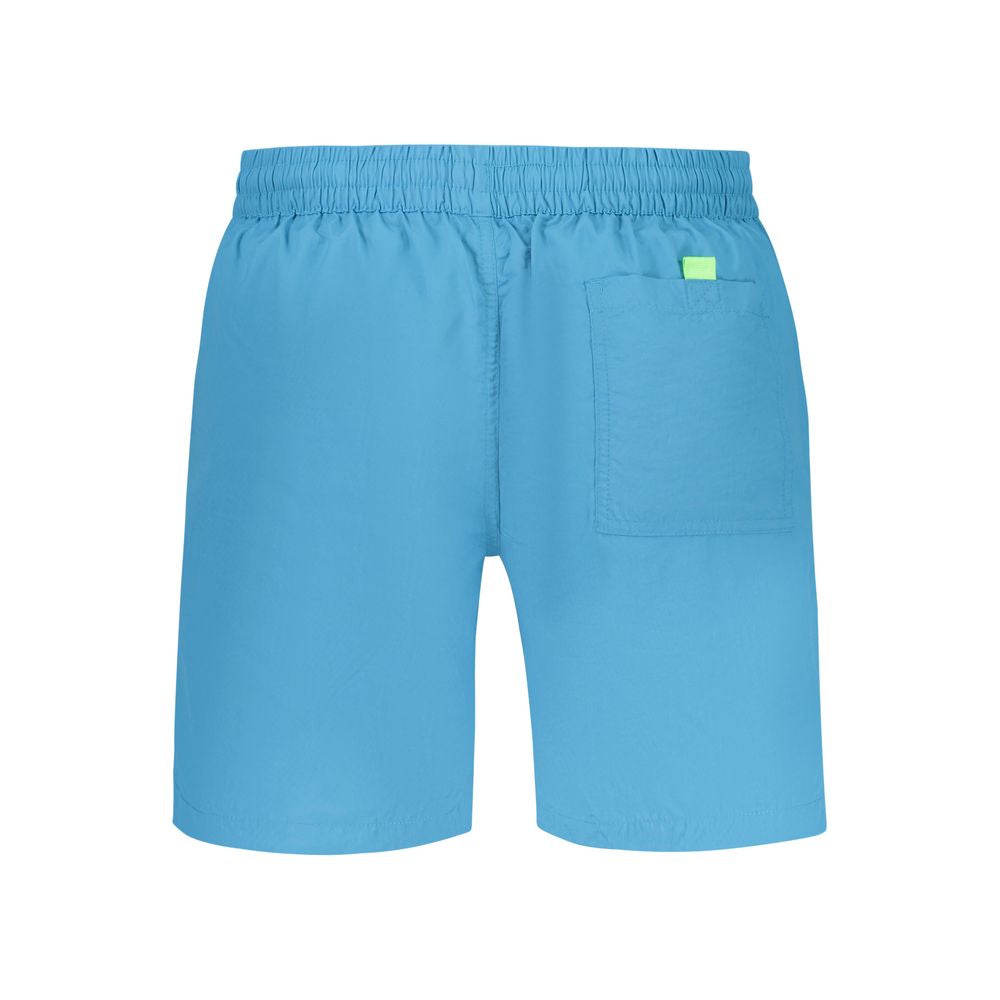 Swim Shorts by Norway 1963 for men in polyamide blue & print showcases a sculptural silhouette, expertly capturing the sophisticated essence of the sculptural Men's Polyamide Swim Shorts design for a premium poolside look.