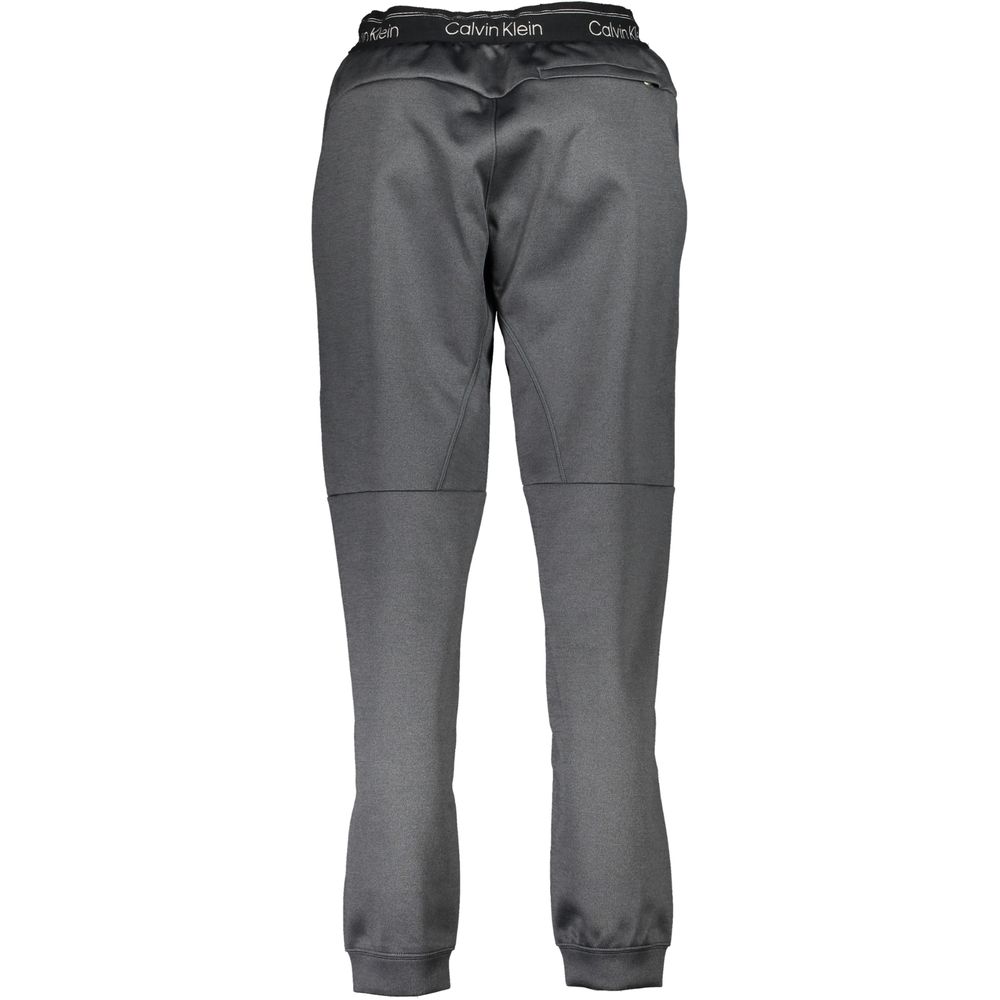 Pants by Calvin Klein for women in polyester black features a stylish silhouette with a stylish , long, and .