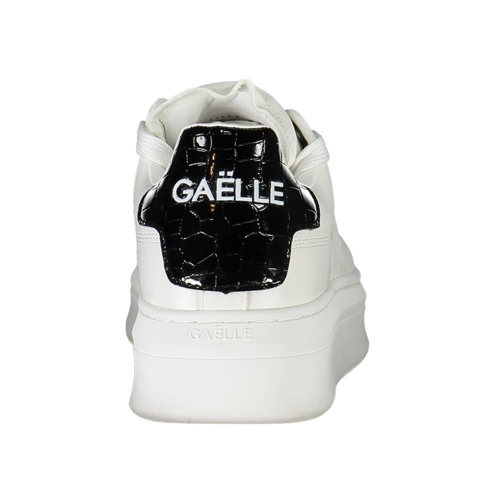 Athletic Sneakers by Gaelle Paris for women in organic cotton & polyurethane gray & white presents a sleek silhouette, perfectly capturing the athletic style essence of Women's Athletic Organic Cotton & Polyurethane Sneakers with its sleek design and premium finish.