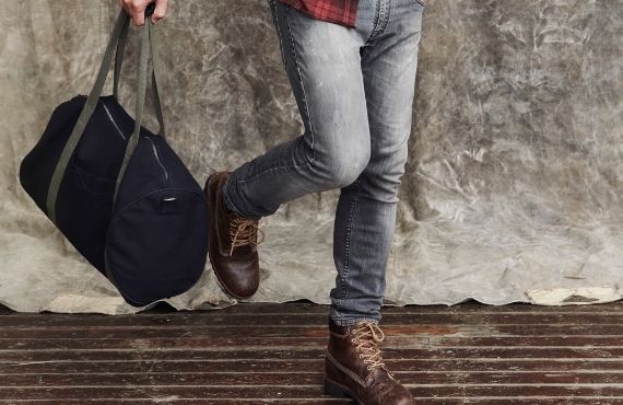 Men's designer luggage and travel bags available at Moon Behind the Hill