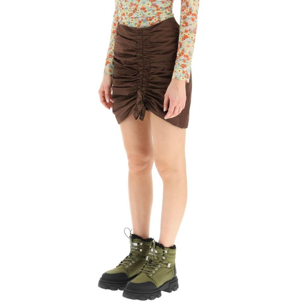 Skirt by Ganni for women in acetate & nylon brown showcases a dramatic silhouette, artfully capturing the essence of the Women's Acetate & Nylon Skirt in a dramatic mini cut for a refined look.