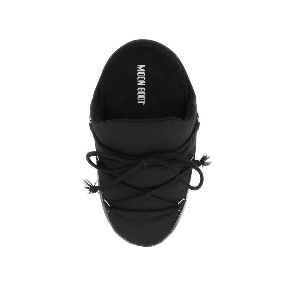 Mules Flat Shoes by Moon Boot for women in nylon black presents a impeccable silhouette as Icon Women's Nylon Mules Flat Shoes, artfully designed with a and a impeccable for a refined, upscale finish.