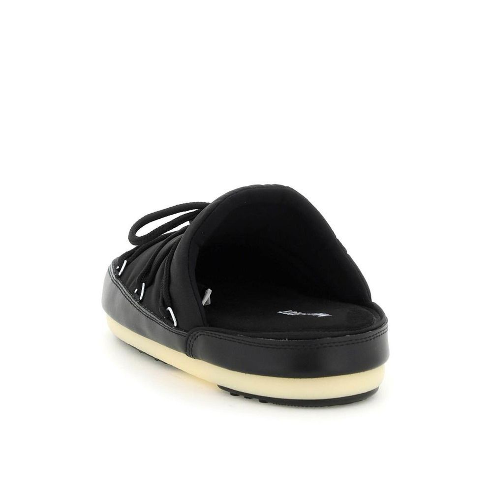 Mules Flat Shoes by Moon Boot for women in nylon black features an captivating silhouette, showcasing the captivating style of the Icon Women's Nylon Mules Flat Shoes with its distinct and refined .