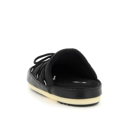 Mules Flat Shoes by Moon Boot for women in nylon black features an captivating silhouette, showcasing the captivating style of the Icon Women's Nylon Mules Flat Shoes with its distinct and refined .