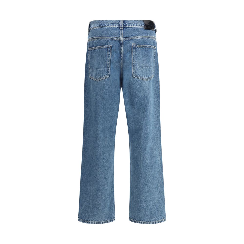 Jeans by Our Legacy for men in denim cotton blue presents a tailored silhouette, showcasing a tailored tapered-leg & regular-fit and long cut with a refined high rise for a truly tailored aesthetic.