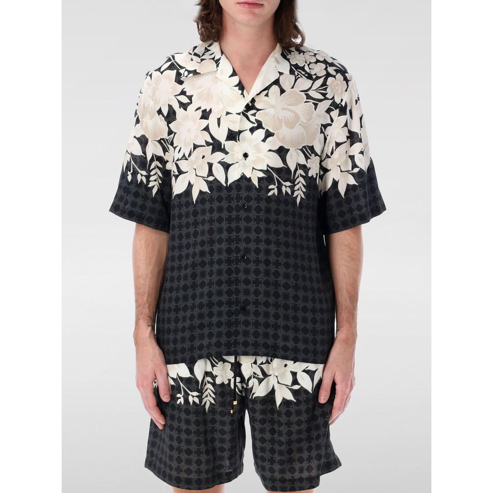Shirt by Amiri for men in silk black, patterned, floral & print, featuring a nuanced short-sleeve and nuanced for a sophisticated finish.
