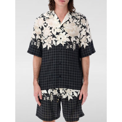 Shirt by Amiri for men in silk black, patterned, floral & print, featuring a nuanced short-sleeve and nuanced for a sophisticated finish.