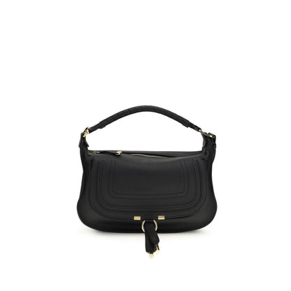 Mini Crossbody Flap Shoulder Bag by Chloé for women in bos taurus calf leather black features an effortlessly chic silhouette with a secure flap & zipper, ample external-pockets, and versatile crossbody-strap, shoulder-strap, adjustable-strap & handle for effortlessly chic everyday luxury.