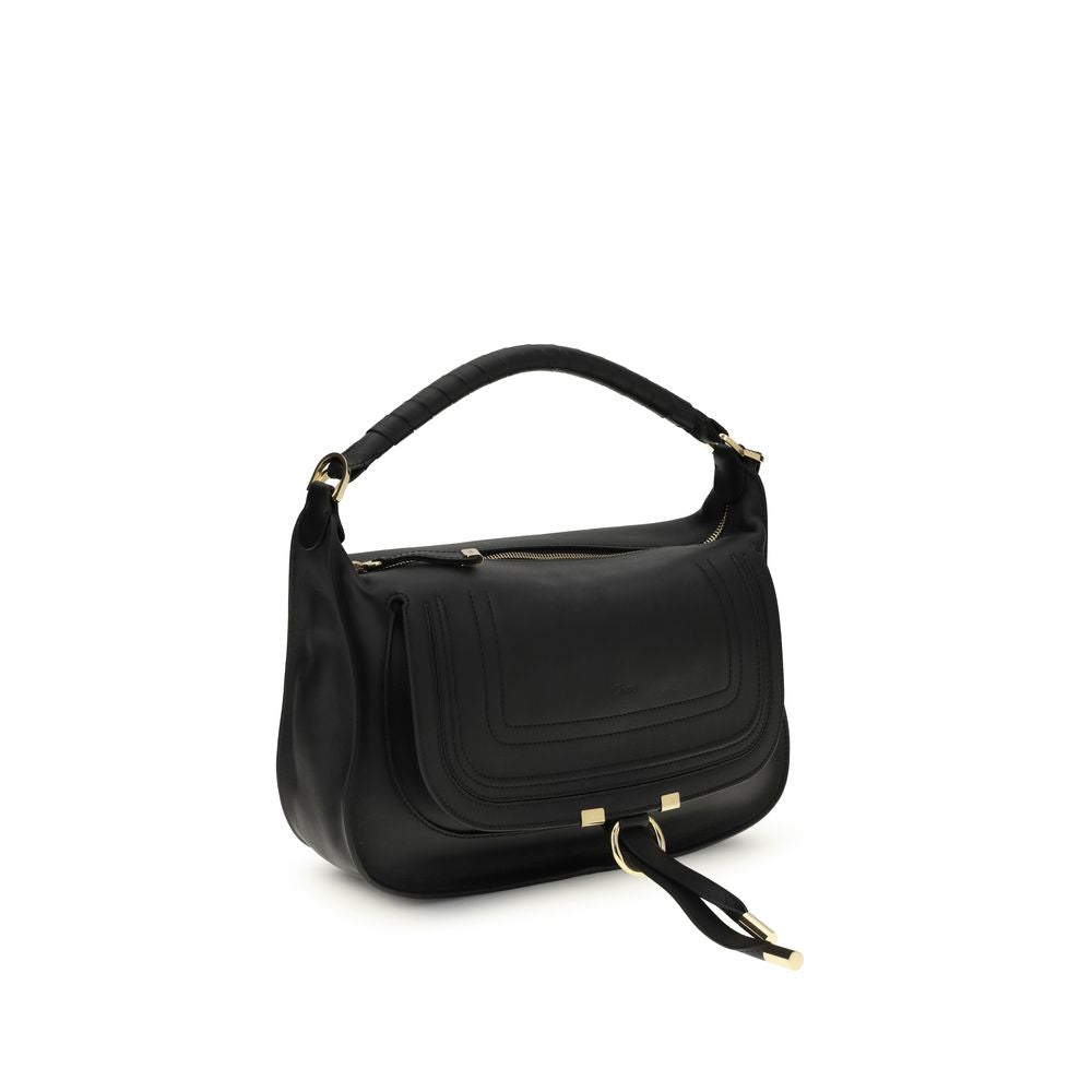 Mini Crossbody Flap Shoulder Bag by Chloé for women in bos taurus calf leather black presents a versatile silhouette, showcasing a secure flap & zipper and versatile external-pockets with versatile crossbody-strap, shoulder-strap, adjustable-strap & handle for a sophisticated look.