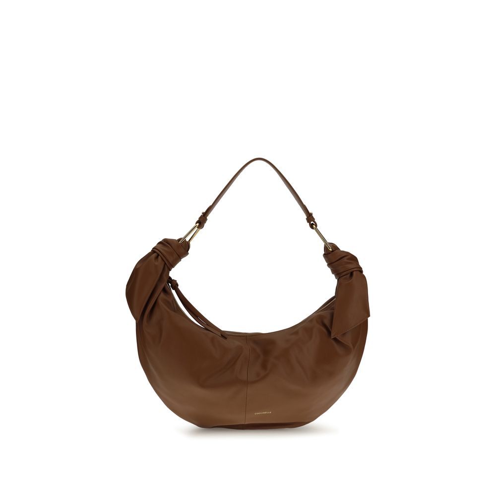 Shoulder Bag by Coccinelle for women in bos taurus calf leather brown & gold features a distinguished silhouette, showcasing a secure zipper and distinguished with versatile shoulder-strap & handle for a distinguished finish.
