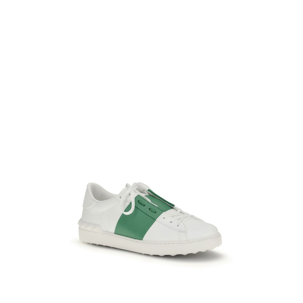 Sneakers by Valentino Garavani for men in bos taurus calf leather white presents a sumptuous silhouette, artfully capturing the essence of the Men's Low Top Slip On Bos Taurus Calf Leather Sneakers with its sumptuous low-top slip-on style design.