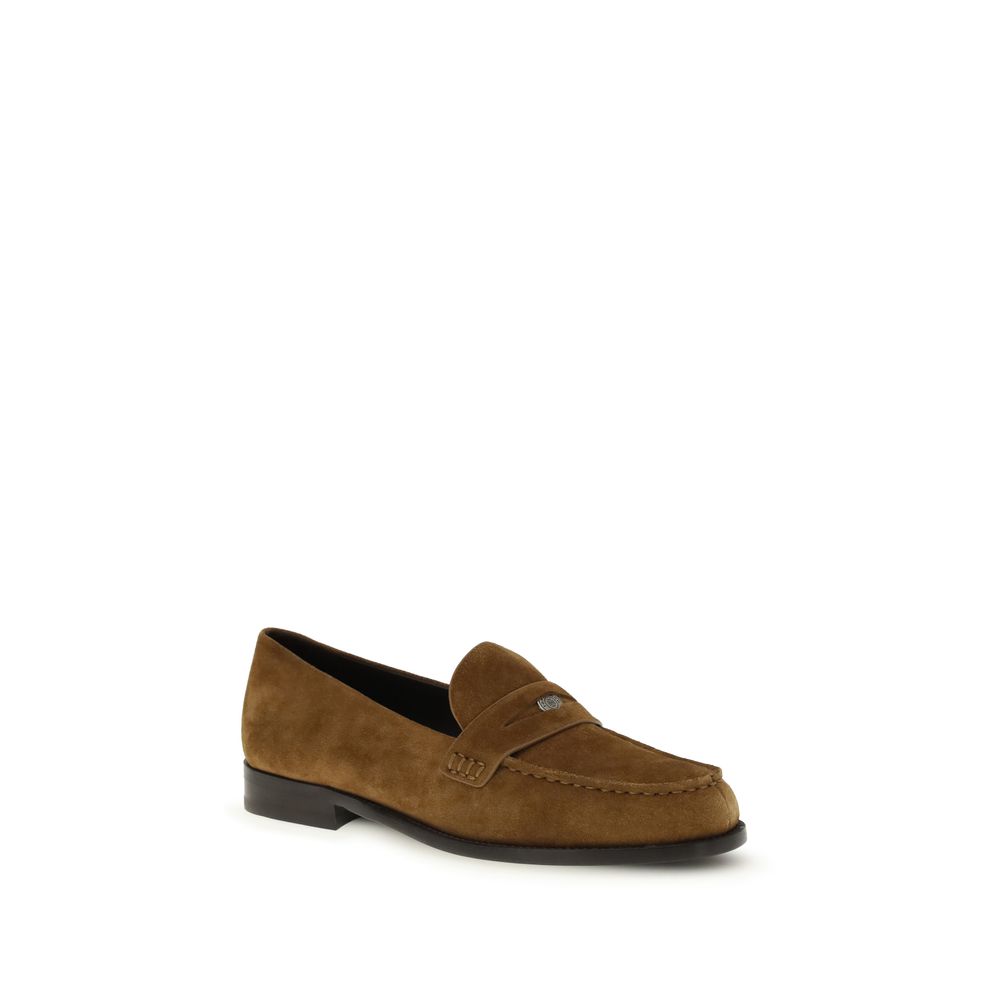 Flat Loafer Slip-On Shoes by Tory Burch for women in bos taurus calf nappa & suede leather beige showcases a timeless silhouette from the Women's Bos Taurus Calf Nappa & Suede Leather Flat Loafer Slip-On Shoes collection, featuring a timeless flat and for a timeless finish.