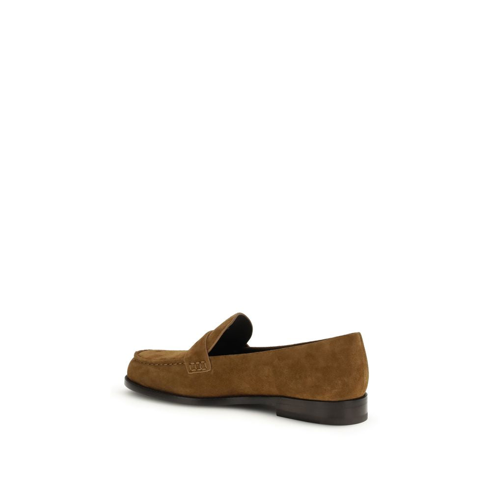 Flat Loafer Slip-On Shoes by Tory Burch for women in bos taurus calf nappa & suede leather beige features an dynamic silhouette from the Women's Bos Taurus Calf Nappa & Suede Leather Flat Loafer Slip-On Shoes collection, defined by a dynamic and flat for a dynamic look.