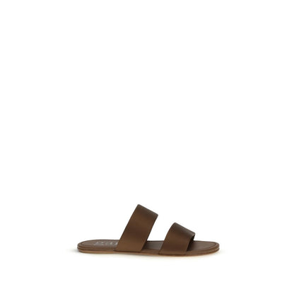 Flat Sandals by Pedro García for women in bos taurus calf leather brown features an effortlessly chic silhouette from the Women's Bos Taurus Calf Leather Flat Sandals collection, showcasing a effortlessly chic flat and elegant .