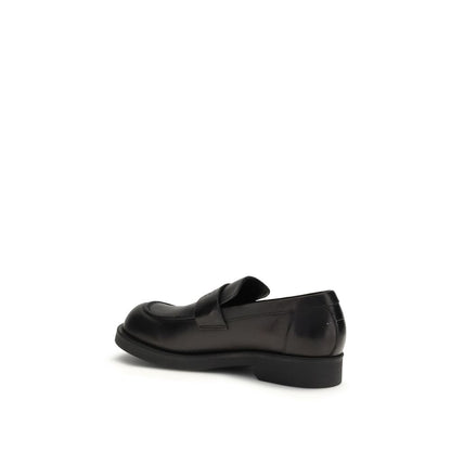 Flat Loafer Slip-On Shoes by MM6 for men in bos taurus calf leather black features an effortless chic silhouette, showcasing the Men's Bos Taurus Calf Leather Flat Loafer Slip-On Shoes design with an effortless chic flat and a round toe style for a effortless chic look.
