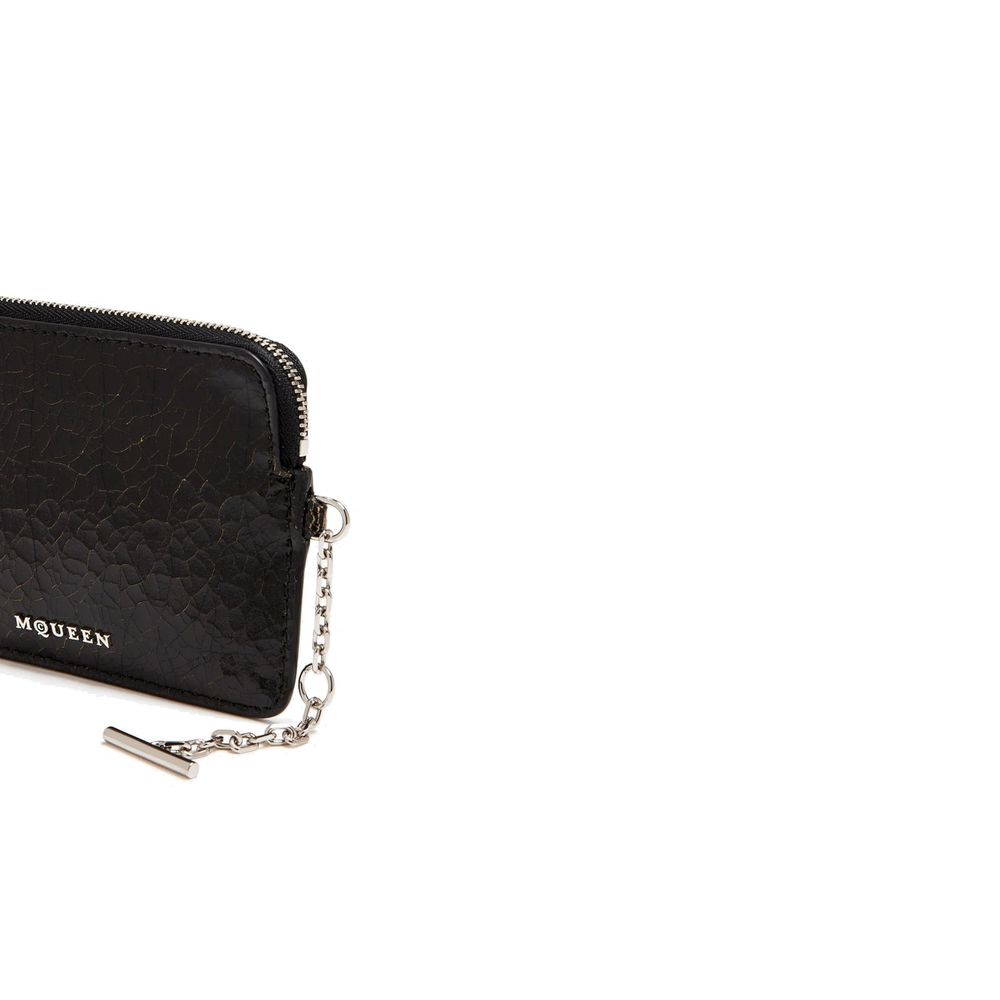 Clutch Handbag by Alexander McQueen for unisex in calfskin suede leather black & silver features a sculptural silhouette with a secure zipper, ample cardholder, and versatile for a sculptural finish.