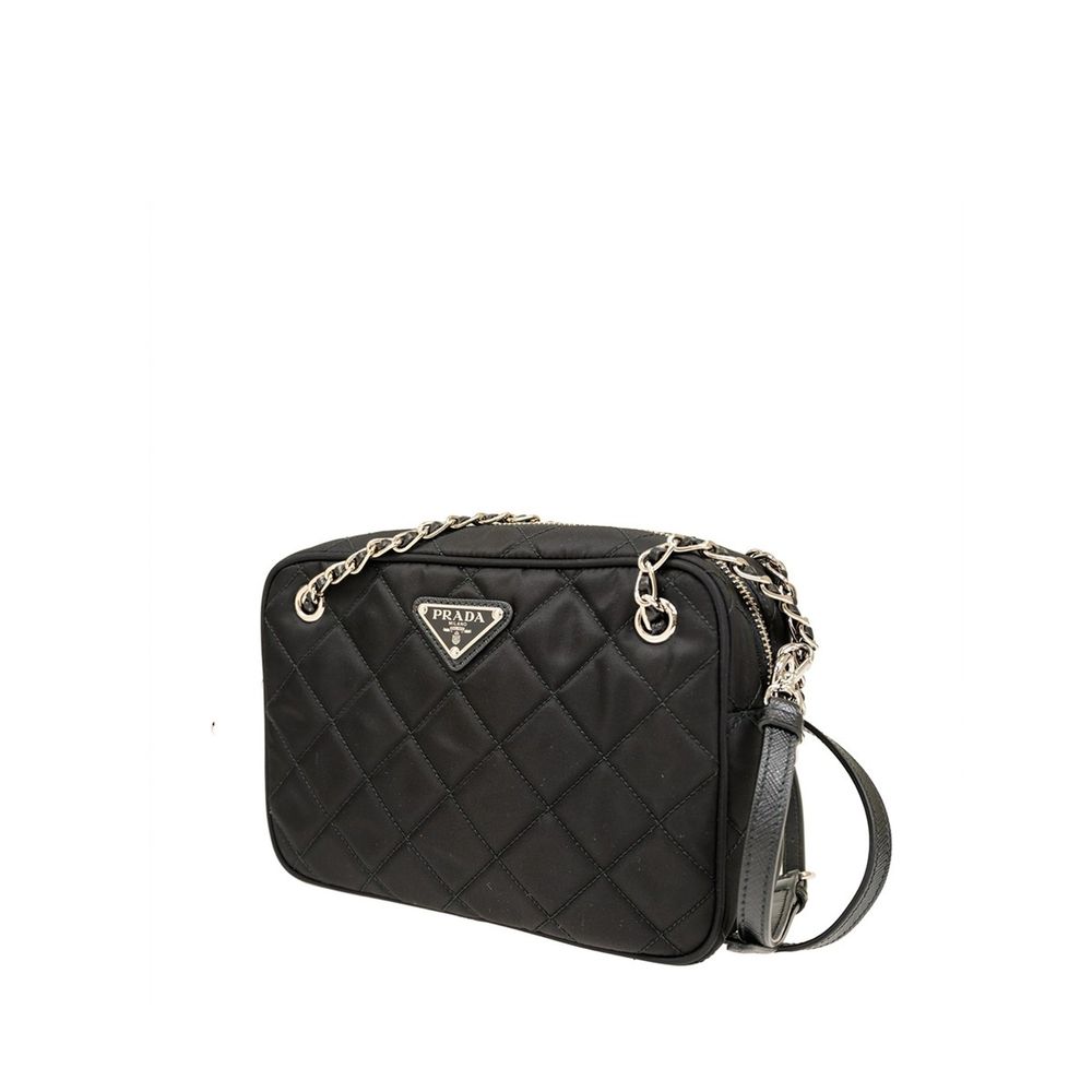 Crossbody Handbag by Prada for women in nylon black features a transformative sophistication silhouette, showcasing a secure zipper, ample , and versatile crossbody-strap, shoulder-strap & detachable-strap for a transformative sophistication look.