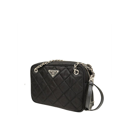Crossbody Handbag by Prada for women in nylon black features a transformative sophistication silhouette, showcasing a secure zipper, ample , and versatile crossbody-strap, shoulder-strap & detachable-strap for a transformative sophistication look.