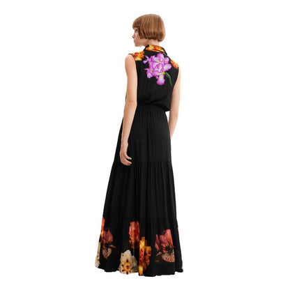 Dress by Desigual for women in viscose black, patterned & floral features an eye catching silhouette with a sophisticated , elegant , and a refined long for a eye catching aesthetic.