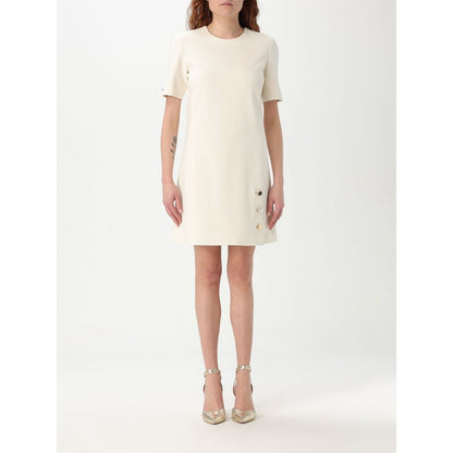 Dress by Twinset for women in polyester pearl showcases a striking silhouette, elegantly detailed with a short-sleeve, refined , and a striking short for a striking finish.