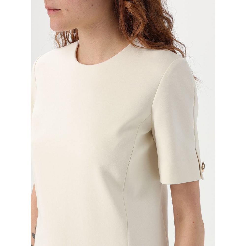 Dress by Twinset for women in polyester pearl features a dramatic silhouette, showcasing an elegant and that flows into a dramatic short.