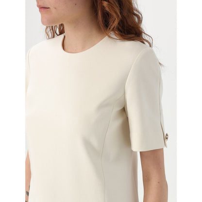 Dress by Twinset for women in polyester pearl features a dramatic silhouette, showcasing an elegant and that flows into a dramatic short.