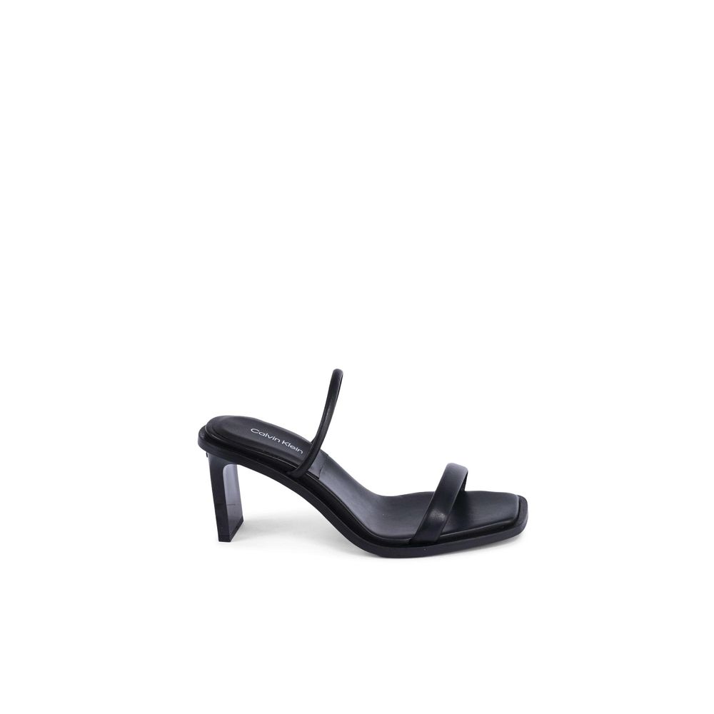 Stiletto Sandals by Calvin Klein for women in leather black features an effortlessly chic silhouette from the Women's Leather Stiletto Sandals collection, showcasing a effortlessly chic stiletto and elegant .
