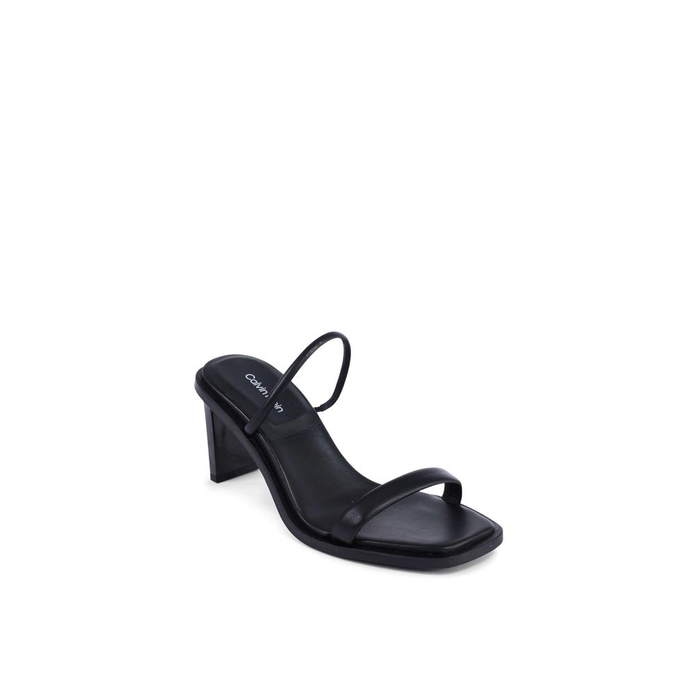 Stiletto Sandals by Calvin Klein for women in leather black features an architectural design from the Women's Leather Stiletto Sandals collection, defined by a architectural stiletto and for a architectural finish.