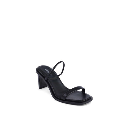 Stiletto Sandals by Calvin Klein for women in leather black features an architectural design from the Women's Leather Stiletto Sandals collection, defined by a architectural stiletto and for a architectural finish.
