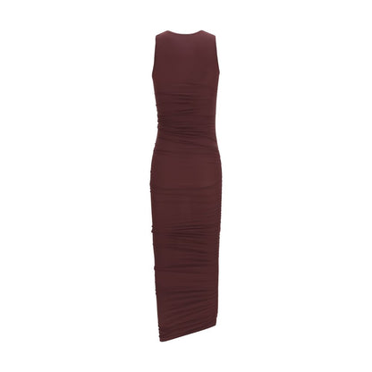 Dress by Wolford for women in stretch polyamide bordeaux showcases a striking silhouette, elegantly detailed with a , refined round asymmetric neckline, and a striking midi for a striking finish.