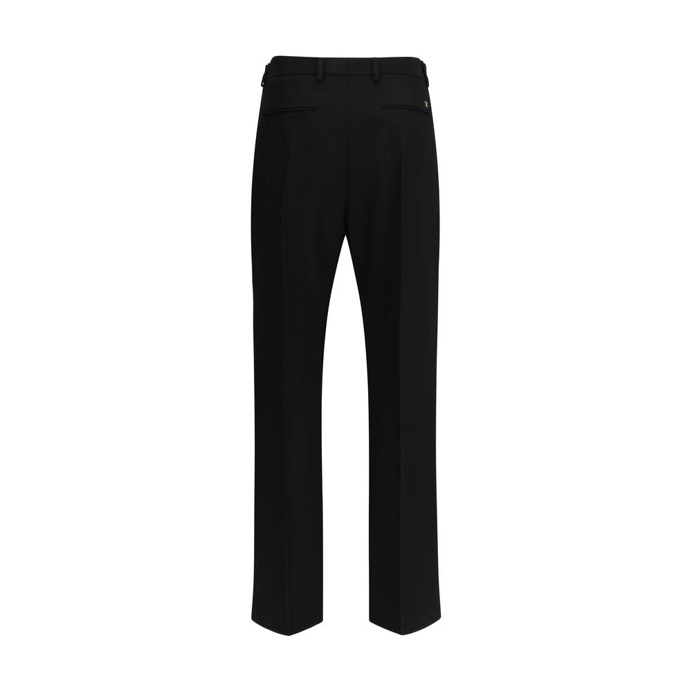 Trousers by Valentino Garavani for men in virgin wool black & signature features an sartorial silhouette, showcasing a precise regular-fit and long with a sartorial for a refined look.