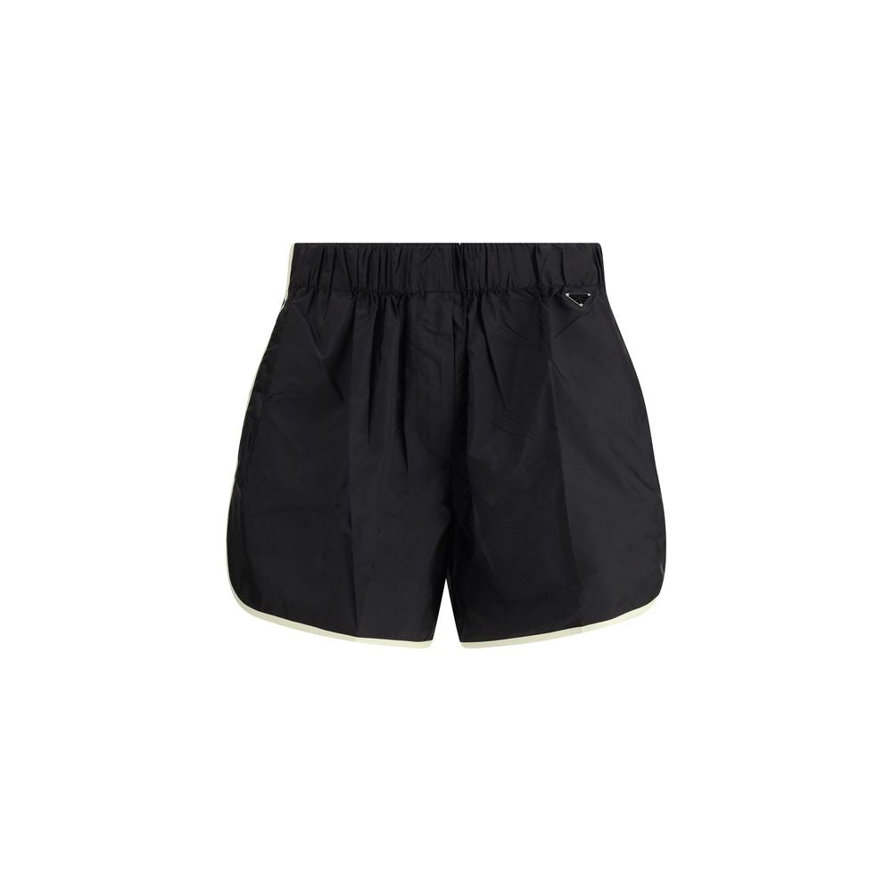Bermuda Shorts by Prada for women in nylon black & signature features an tailored silhouette, showcasing a tailored slim & oversized with a short and for a sophisticated look.