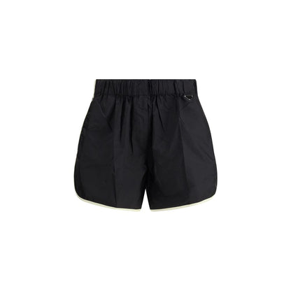 Bermuda Shorts by Prada for women in nylon black & signature features an tailored silhouette, showcasing a tailored slim & oversized with a short and for a sophisticated look.