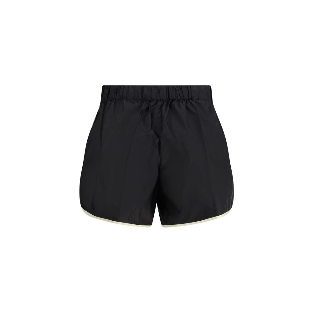Bermuda Shorts by Prada for women in nylon black & signature showcases a on trend silhouette, featuring a tailored slim & oversized with a classic short and sophisticated for a on trend finish.