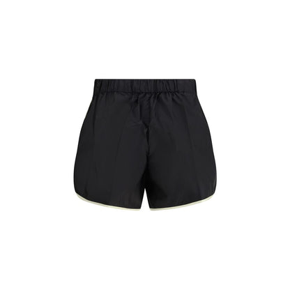 Bermuda Shorts by Prada for women in nylon black & signature showcases a on trend silhouette, featuring a tailored slim & oversized with a classic short and sophisticated for a on trend finish.