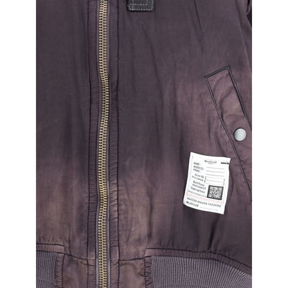 Jacket by Maison Mihara Yasuhiro for men in rayon & cotton black showcases a enveloping silhouette, artfully detailed with a enveloping and premium for a truly enveloping finish.