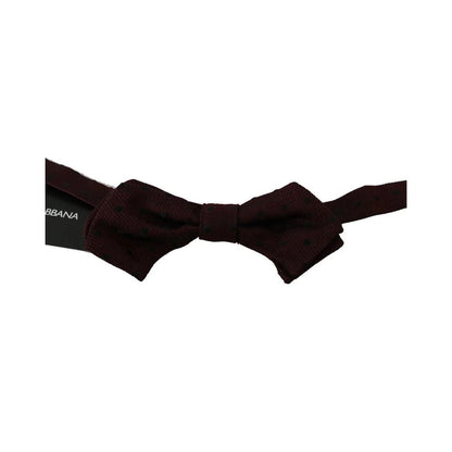 Necktie by Dolce & Gabbana for men in silk multicolor & purple showcases a stately silhouette, expertly detailed with a stately finish that perfectly captures the sophisticated essence of the Silk Necktie.