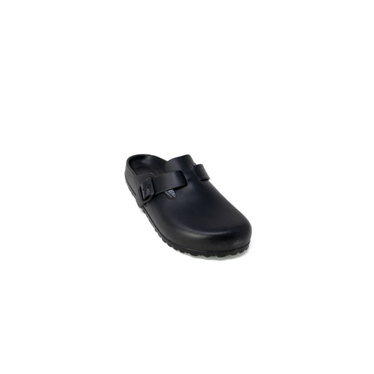 Clogs Slippers by Birkenstock for women in synthetic leather & cork black presents a effortless silhouette, showcasing the elegant Women's Synthetic Leather & Cork Clogs Slippers design with its unique and sophisticated .