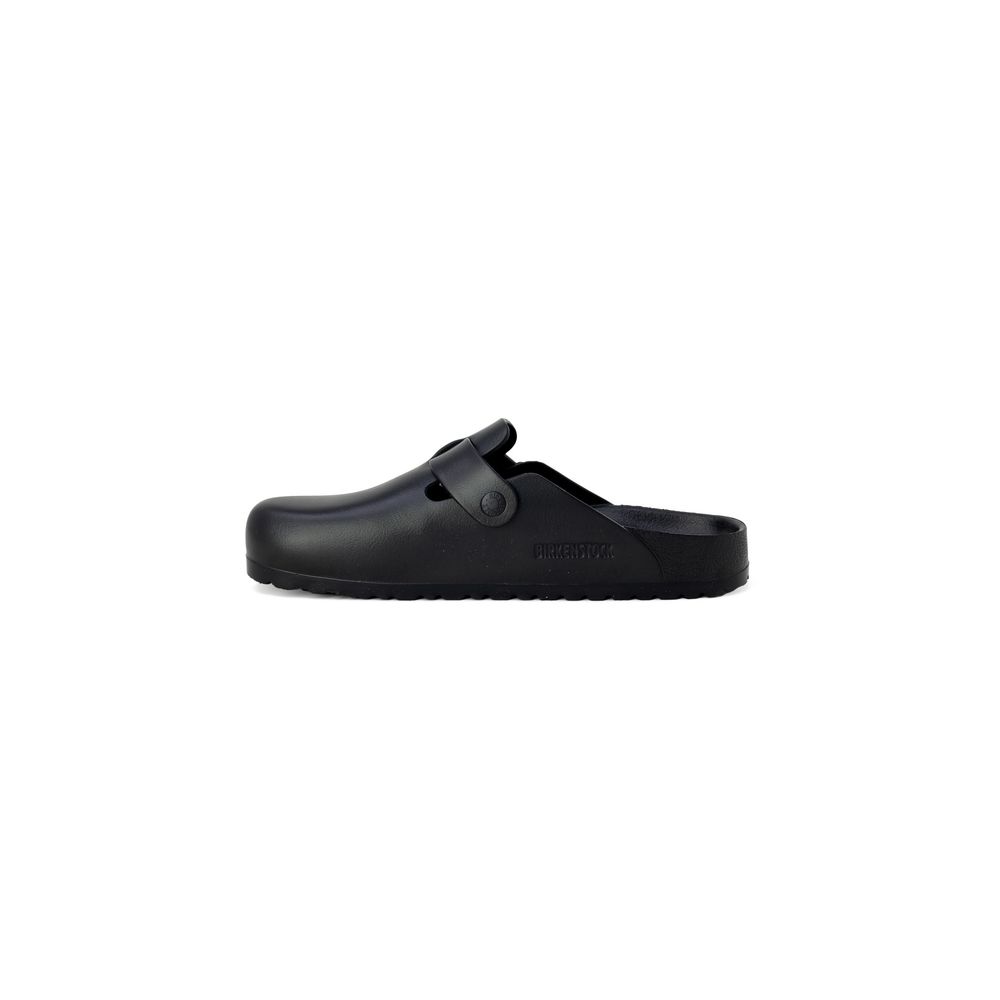 Clogs Slippers by Birkenstock for women in synthetic leather & cork and black presents a sculptural silhouette as Women's Synthetic Leather & Cork Clogs Slippers, featuring a sculptural and a sculptural for refined comfort.