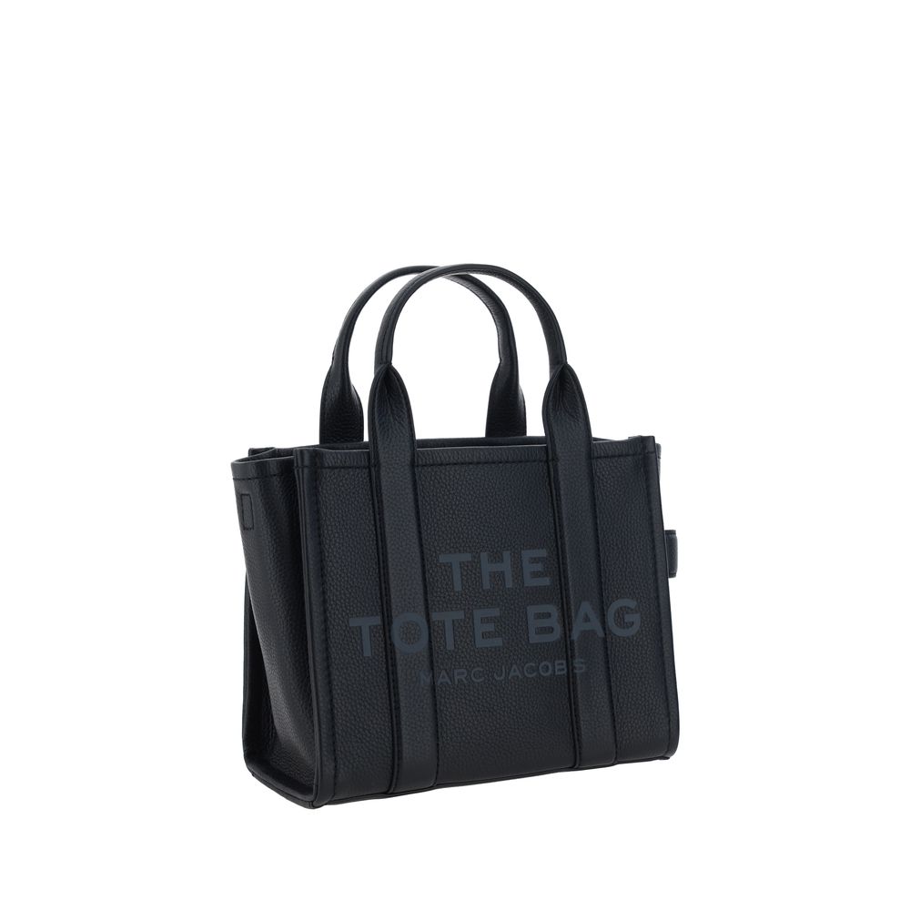 Small Crossbody Handbag by Marc Jacobs for women in bos taurus calf grained leather black & monogram presents a ornamental silhouette, showcasing a secure , ample , and versatile crossbody-strap, shoulder-strap, handle & adjustable-strap for a ornamental finish.