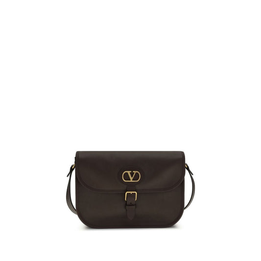 Shoulder Flap Bag by Valentino Garavani for men in bos taurus suede calfskin leather brown features a effortless sophistication silhouette, secured by a flap, magnetic & button with ample cardholder and versatile shoulder-strap & adjustable-strap for a effortless sophistication finish.