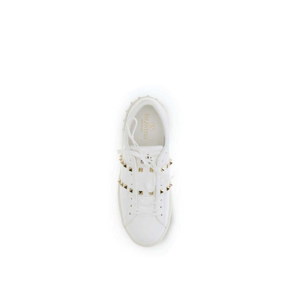 Sneakers by Valentino Garavani for men in bos taurus calfskin leather white features a chic design, perfectly showcasing the chic low-top style of this Rockstud Men's Low Top Bos Taurus Calfskin Leather Sneakers.