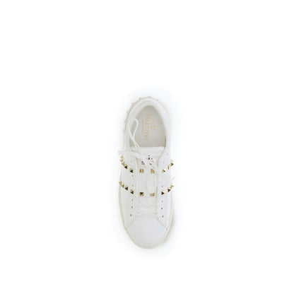 Sneakers by Valentino Garavani for men in bos taurus calfskin leather white features a chic design, perfectly showcasing the chic low-top style of this Rockstud Men's Low Top Bos Taurus Calfskin Leather Sneakers.