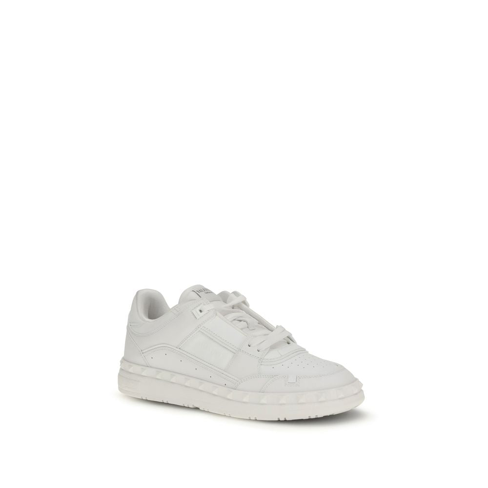Sneakers by Valentino Garavani for men in bos taurus calf leather white features a chic design, perfectly showcasing the chic low-top style of this Men's Low Top Bos Taurus Calf Leather Sneakers.
