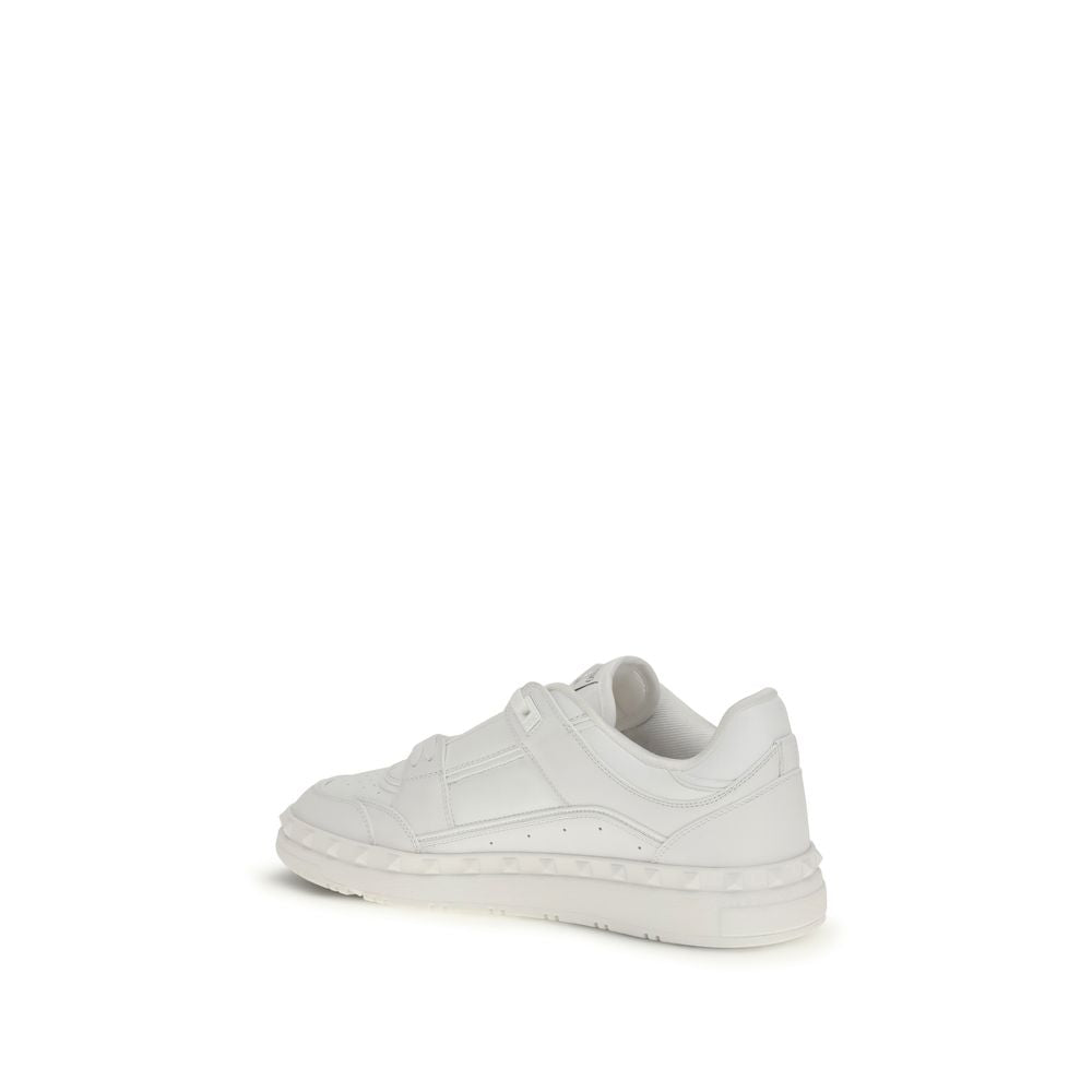 Sneakers by Valentino Garavani for men in bos taurus calf leather white presents a impeccable silhouette as Men's Low Top Bos Taurus Calf Leather Sneakers, expertly defined by a impeccable low-top style for a impeccable, high-fashion look.
