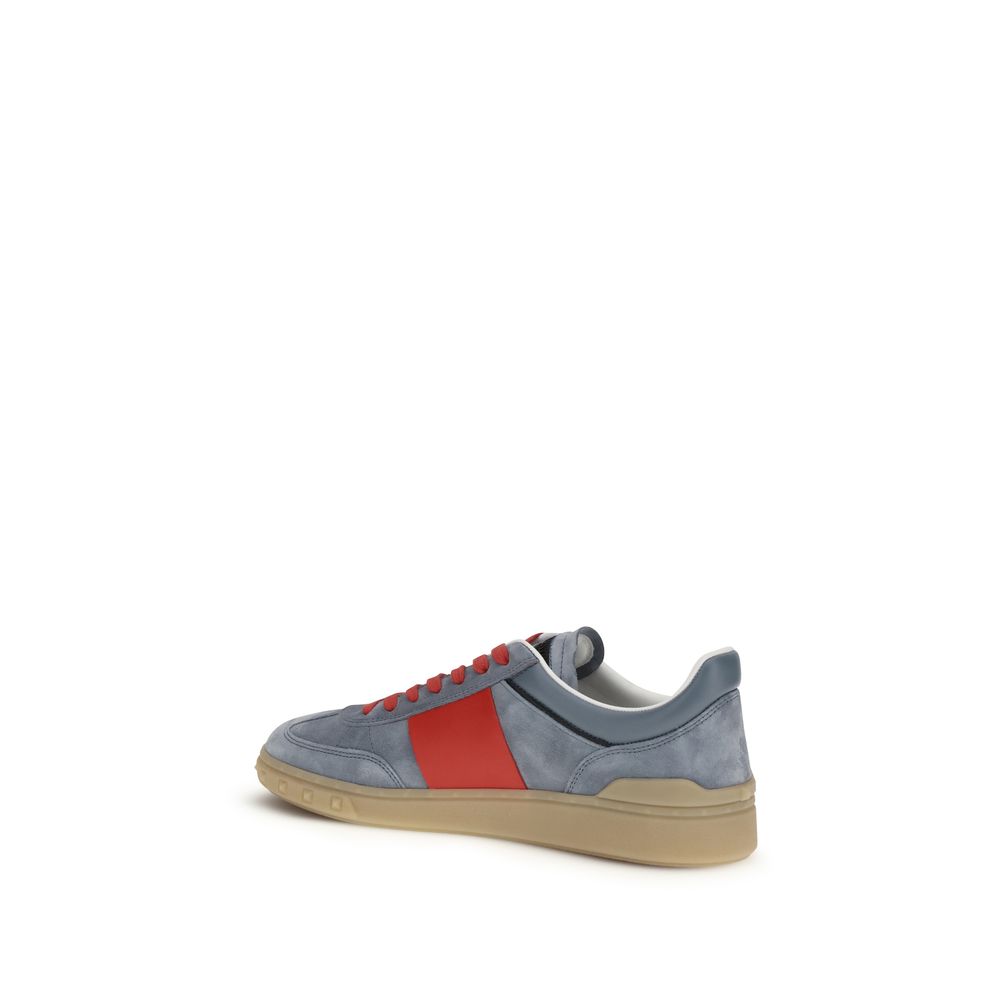 Sneakers by Valentino Garavani for men in bos taurus suede calfskin leather multicolor & signature presents a sumptuous silhouette, artfully capturing the essence of the V Logo Men's Low Top Bos Taurus Suede Calfskin Leather Sneakers with its sumptuous low-top style design.