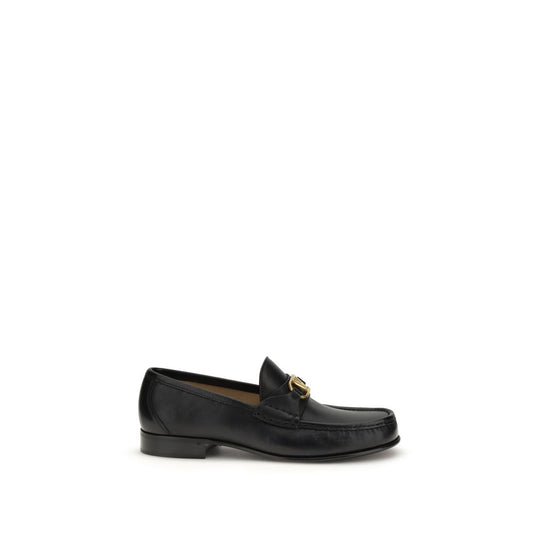 Loafer Slip-On Shoes by Valentino Garavani for men in buffalo & calf leather black & signature showcases a resplendent V Logo Men's Buffalo & Calf Leather Loafer Slip-On Shoes aesthetic, defined by its resplendent and elegant .