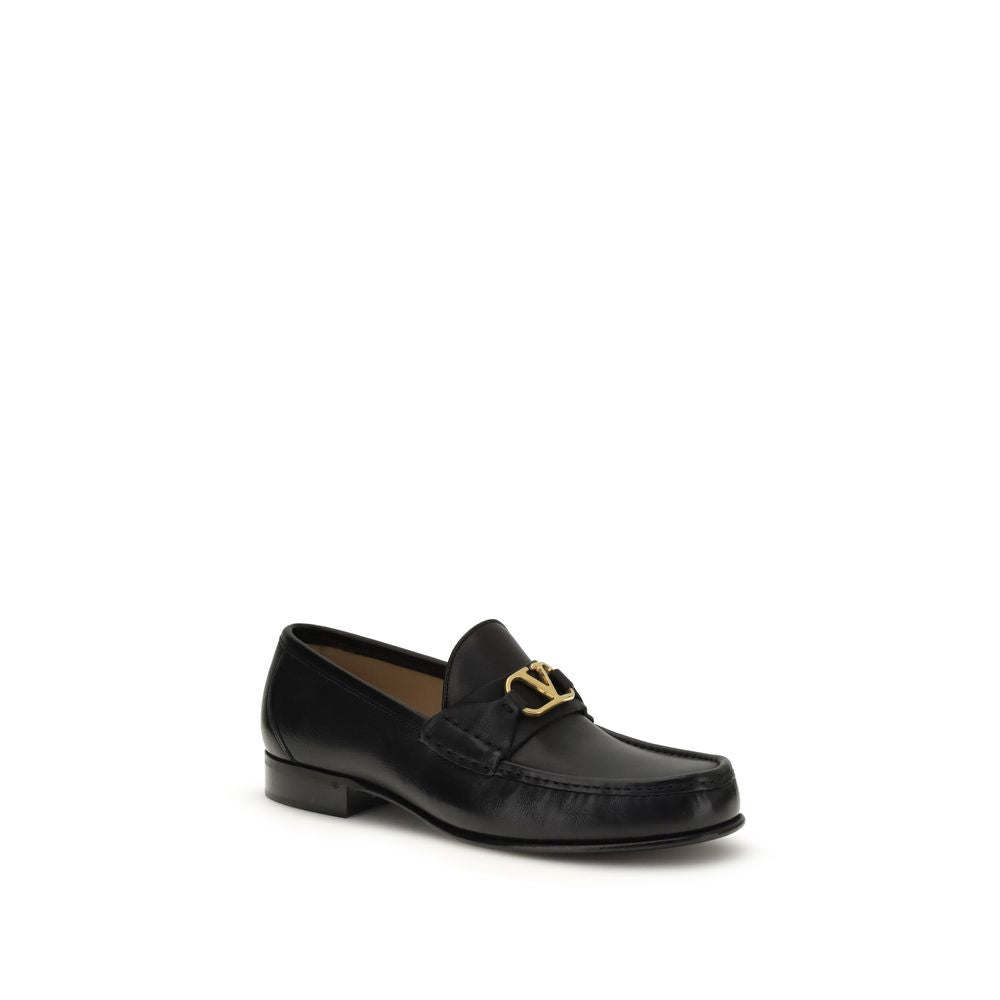 Loafer Slip-On Shoes by Valentino Garavani for men in buffalo & calf leather black & signature features an dynamic silhouette from the V Logo Men's Buffalo & Calf Leather Loafer Slip-On Shoes collection, defined by a dynamic and for a dynamic look.