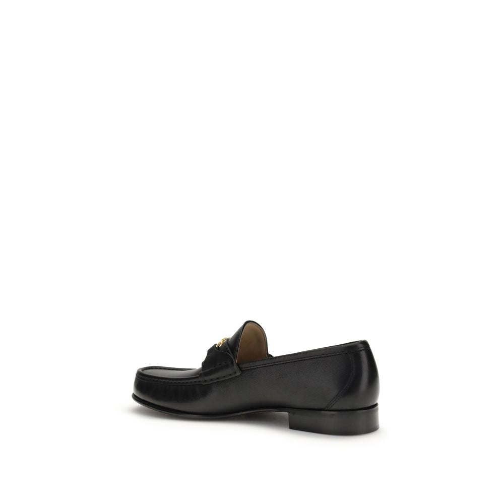 Loafer Slip-On Shoes by Valentino Garavani for men in buffalo & calf leather black & signature showcases a impeccable silhouette as V Logo Men's Buffalo & Calf Leather Loafer Slip-On Shoes, artfully designed with a impeccable and refined for a impeccable finish.